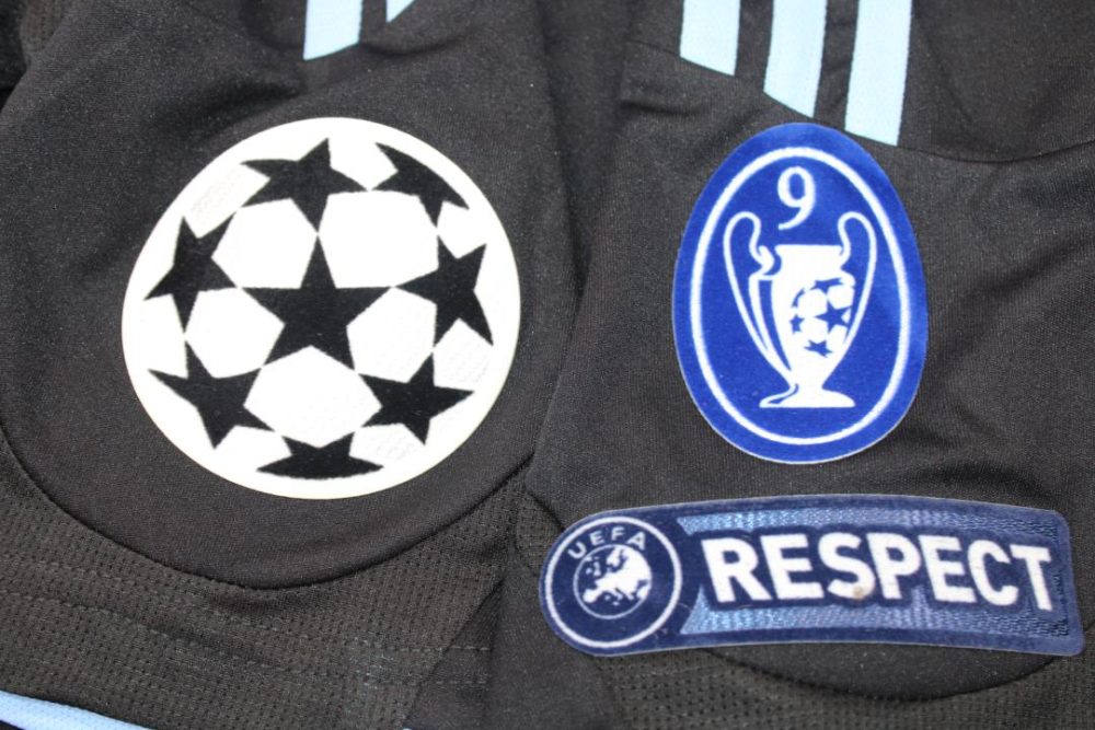 REAL MADRID 09/10 BLACK AWAY RETRO FOOTBALL SHIRT